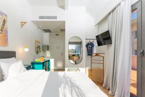Posteľ alebo postele v izbe v ubytovaní The Caravan