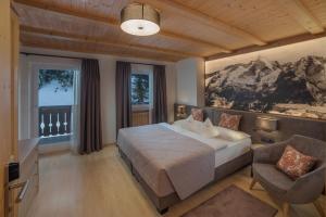 Posteľ alebo postele v izbe v ubytovaní Villa Genziana