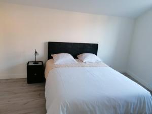 Кровать или кровати в номере La Poire en 2