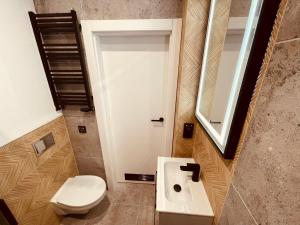 Kúpeľňa v ubytovaní Apartamenty KTW Park Śląski