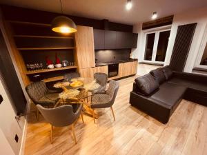 Posedenie v ubytovaní Apartamenty KTW Park Śląski