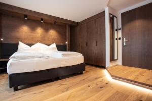 Postel nebo postele na pokoji v ubytování Posthotel Valbella