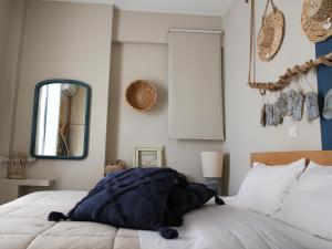 Cama ou camas em um quarto em Beach House in Itea-Delphi