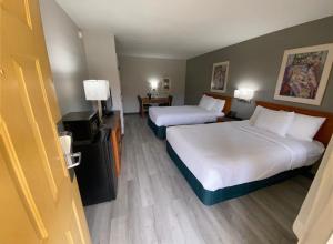 Postel nebo postele na pokoji v ubytování La Quinta Inn by Wyndham Tyler