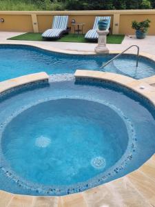 Bassein majutusasutuses Paradise Place Apartments või selle lähedal