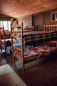 Un ou plusieurs lits superposés dans un hébergement de l'établissement HOSTEL BARRA BAR