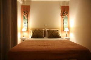 Cama ou camas em um quarto em Beach House in Itea-Delphi