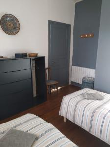 Postel nebo postele na pokoji v ubytování Gîte Moishan