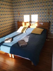 Postel nebo postele na pokoji v ubytování Gîte Moishan
