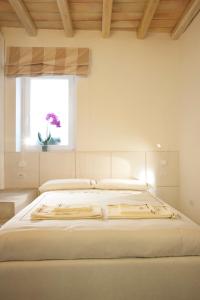 
Letto o letti in una camera di San Francesco Bed & Breakfast

