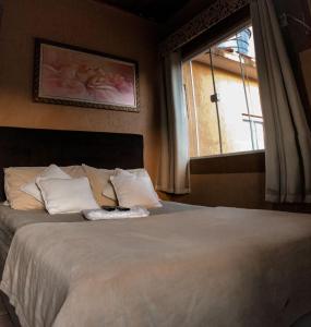 Katil atau katil-katil dalam bilik di Pousada Do Pancho