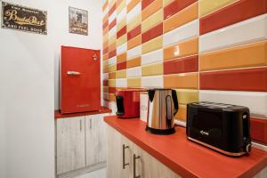 a kitchen with a counter with a coffee maker on it at Centre point Apartment in Budapest