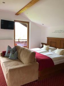 Letto o letti in una camera di Haus Hirschpoint