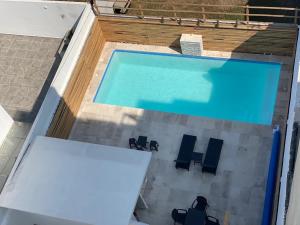 Bazén v ubytování NUEVO Estudio en Playas Vicente Fox. ¡Excelente ubicación! nebo v jeho okolí
