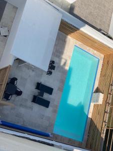 Bazén v ubytování NUEVO Estudio en Playas Vicente Fox. ¡Excelente ubicación! nebo v jeho okolí