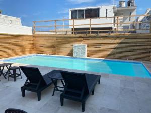 Bazén v ubytování NUEVO Estudio en Playas Vicente Fox. ¡Excelente ubicación! nebo v jeho okolí