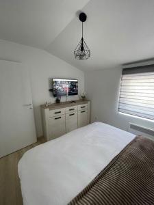 Postel nebo postele na pokoji v ubytování Apartman Mateo Zlatar