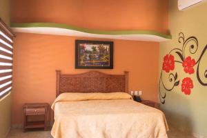 Postel nebo postele na pokoji v ubytování HOTEL RESTAURANTE TEQUILA