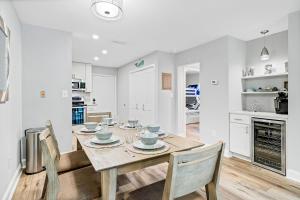 a kitchen and dining room with a table and chairs at Fiddlers Cove 19E in Hilton Head Island