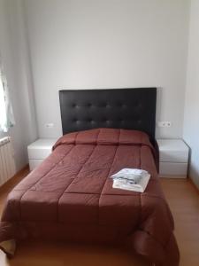 A bed or beds in a room at Duplex casco historico