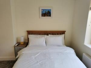 Postel nebo postele na pokoji v ubytování Coliemore Acommodation Dalkey