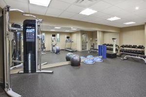 a gym with a lot of equipment and weights at Holiday Inn Columbus Dwtn-Capitol Square, an IHG Hotel in Columbus