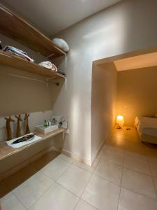 a room with a bed and a light on the floor at POMBO KUNDA in Sanyang +79 photos