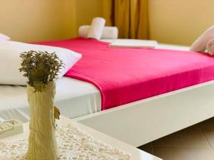 Postel nebo postele na pokoji v ubytování Mintt Hotel