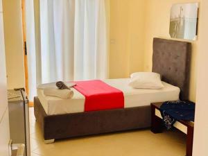 Postel nebo postele na pokoji v ubytování Mintt Hotel