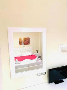 Postel nebo postele na pokoji v ubytování Mintt Hotel