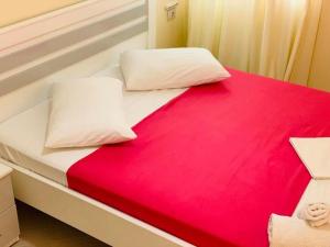 Postel nebo postele na pokoji v ubytování Mintt Hotel