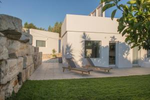 A garden outside New Villa Komos in Pitsidia,Matala,Crete