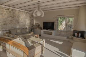 A television and/or entertainment centre at New Villa Komos in Pitsidia,Matala,Crete