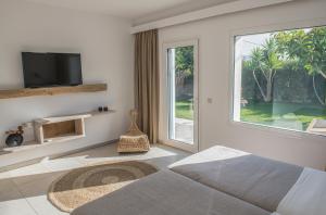 A television and/or entertainment centre at New Villa Komos in Pitsidia,Matala,Crete