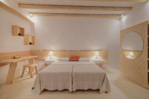 A bed or beds in a room at New Villa Komos in Pitsidia,Matala,Crete