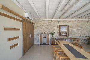 A kitchen or kitchenette at New Villa Komos in Pitsidia,Matala,Crete