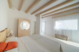 A bed or beds in a room at New Villa Komos in Pitsidia,Matala,Crete