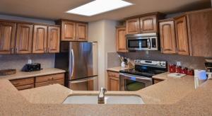 A kitchen or kitchenette at Spacious & Cozy Condo With Wood Fireplace condo