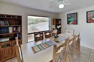 a dining room with a table and chairs and a window at Casa Azul in Western Sedona in Sedona