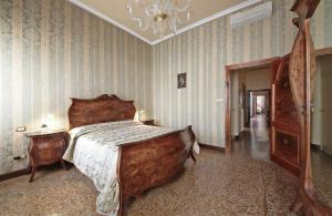 Postel nebo postele na pokoji v ubytování Cà Martinengo