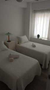 Säng eller sängar i ett rum på Eurosol Carihuela Sun&Beach