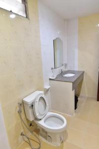 Ett badrum på Ampan Resort & Apartment