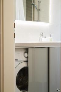 Ένα μπάνιο στο Apartment Green Bike