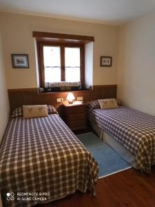 Кровать или кровати в номере Apartamento Mont