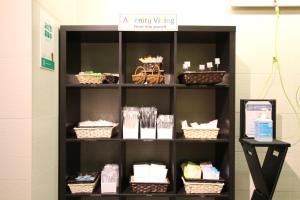 a shelf filled with baskets and other items at KOKO HOTEL Osaka Namba Ebisucho in Osaka +34 photos