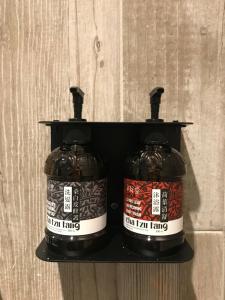 two jars of tea jam sitting on a shelf at The Retro Tai-Pan in Tainan