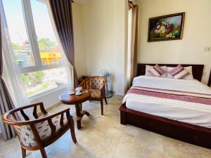 Voodi või voodid majutusasutuse Hoang Quan Hotel toas