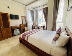 Voodi või voodid majutusasutuse Hoang Quan Hotel toas