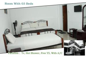Letto o letti in una camera di Charlton Kandy City Rest