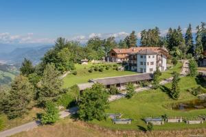 an aerial view of a building on a hill at Ansitz Velseck-Residence Hotel in Tires